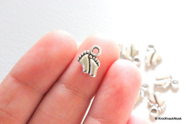 Silver tone new born baby feet charms x 11